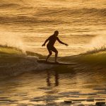 fleeting waves splitting shores