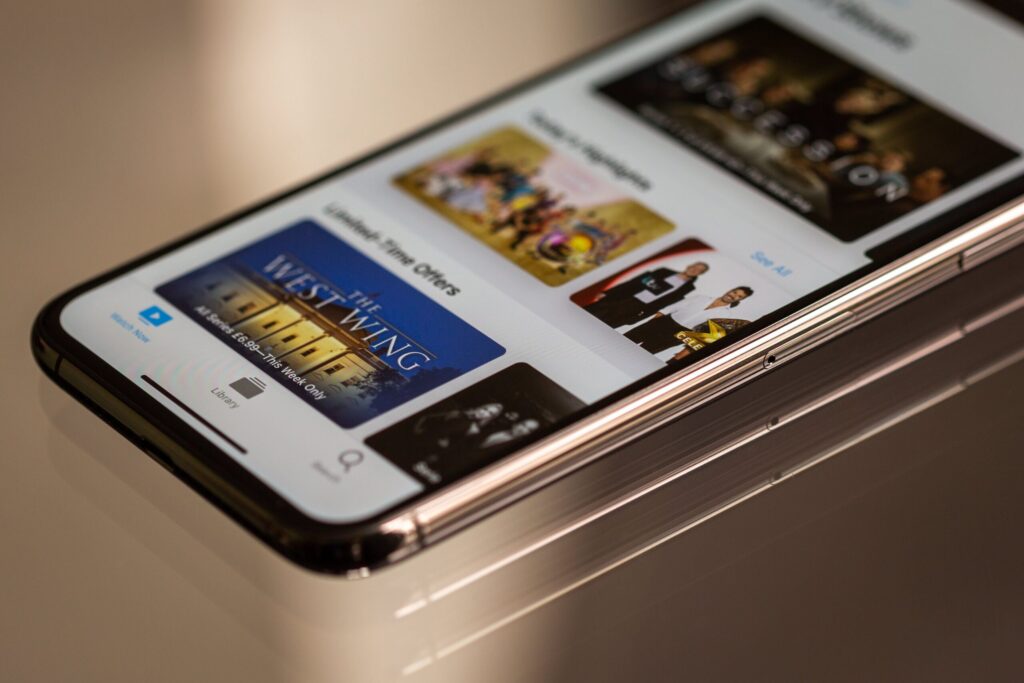 The streaming interface on a phone illustrates how to select video quality when using mobile data.